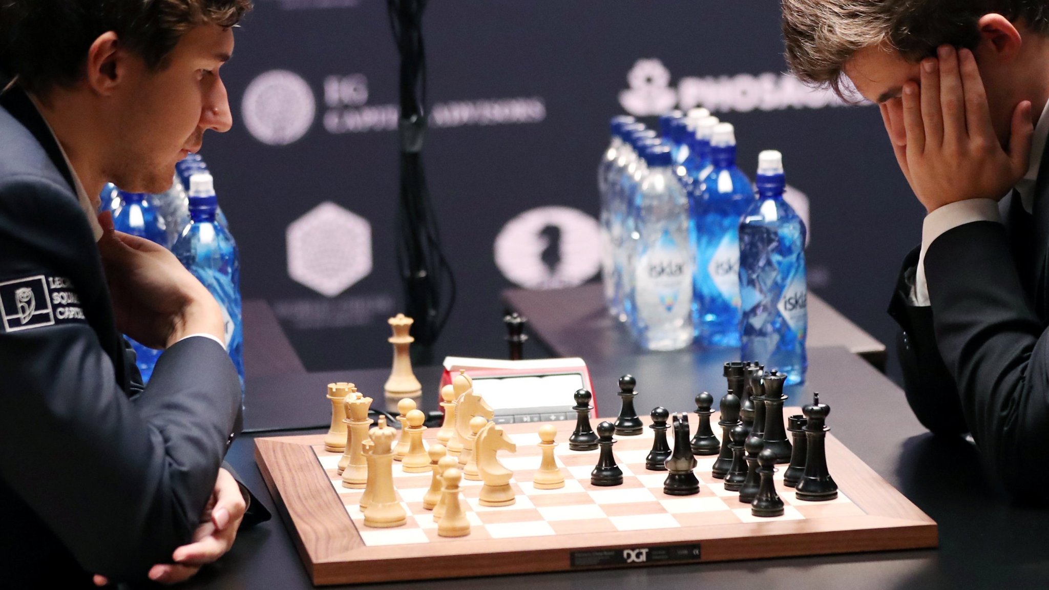 retains chess world champion title Financial Times